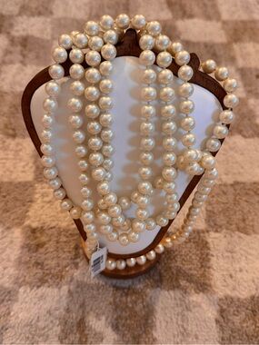 Long strand pearl necklace